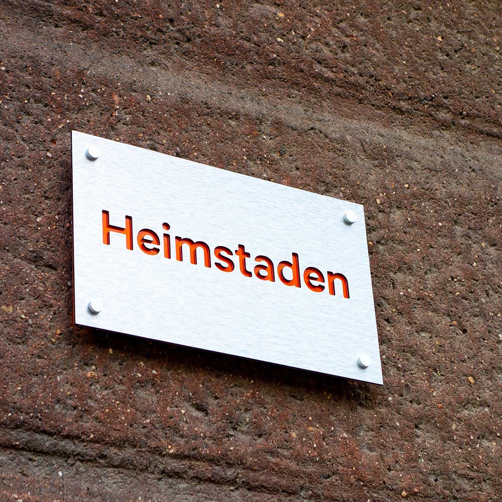 Heimstaden sign on wall